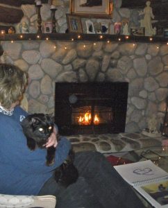 woman holding cat